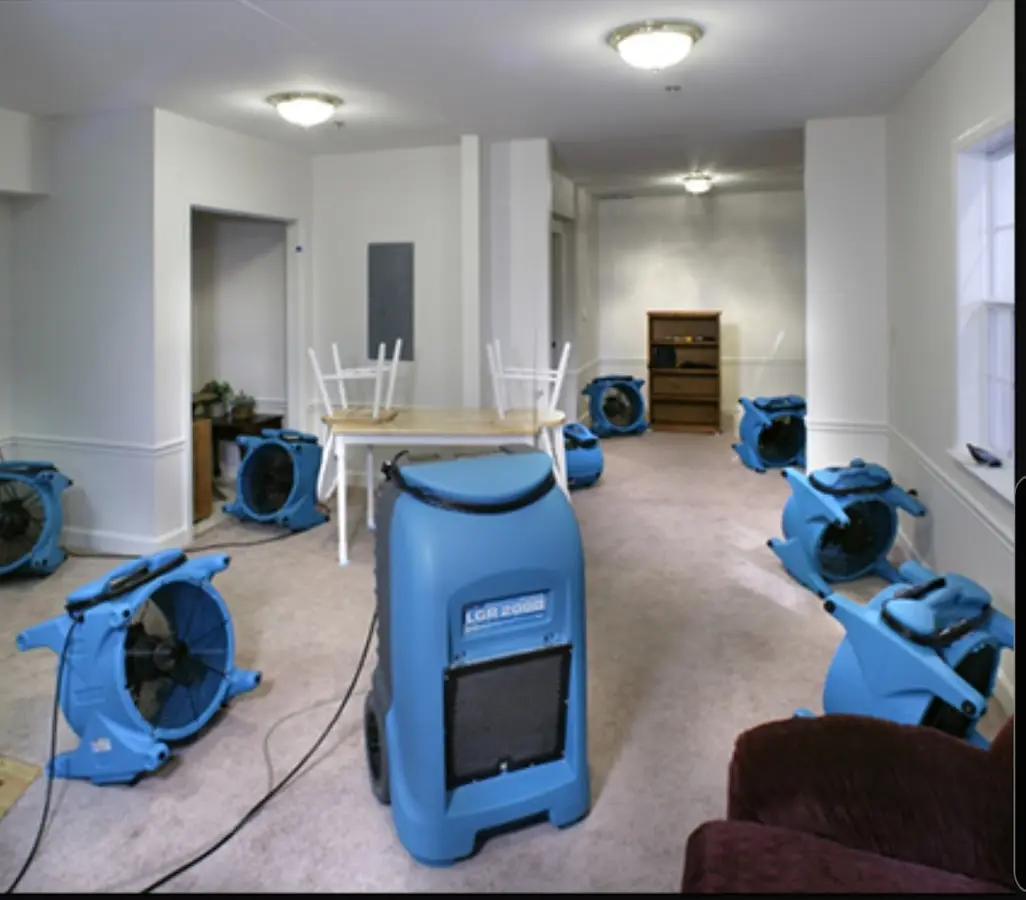 Air movers and dehumidifier setup for Water Damage Restoration in Larchmont